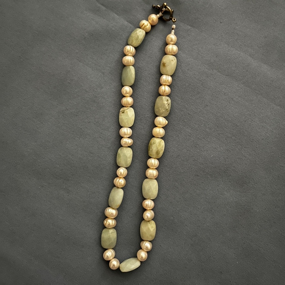 Vintage frosted white and green glass beads necklace with silver closure.